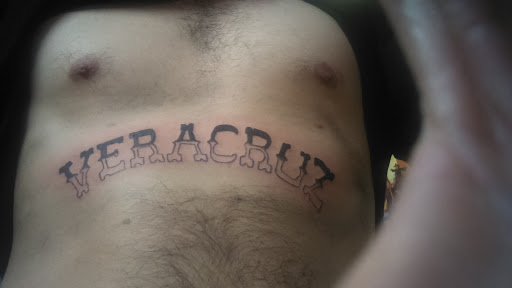 Explore basketball tattoo ideas for guys, creative tattoo ideas in Menomonee Falls, available at Color Bomb Tattoo Shop and Body Piercing