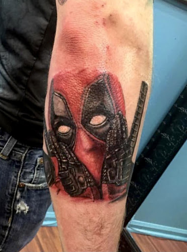 Explore infinity tattoo ideas for men, creative tattoo ideas in Flint, available at Legendary Tattoo Studio