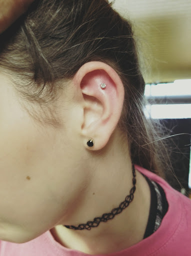 Explore neck tattoo idea, creative tattoo ideas in Conway, available at Primal Urge Tattoos