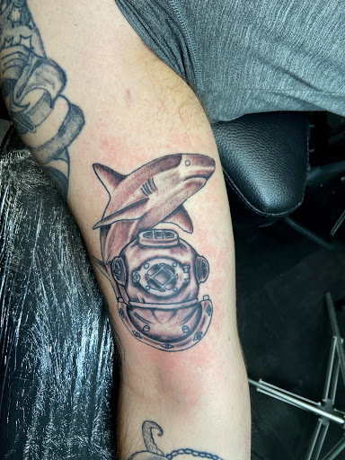 Find women's rib tattoo ideas for your next unique tattoo in Meridian at Creative Pain Tattoo Studio