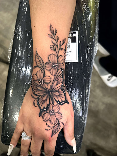 Explore tribal sun tattoo ideas, creative tattoo ideas in Atlanta, available at Iron Palm Tattoos & Body Piercing Atlanta