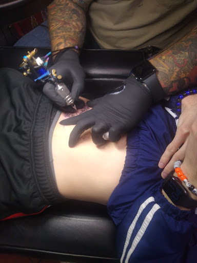 Explore infinity tattoo ideas for men, creative tattoo ideas in Orange Park, available at Big City Tattoo and Piercing