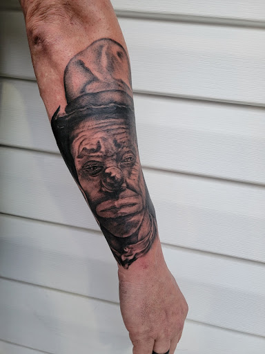 Explore background tattoo ideas sleeve, creative tattoo ideas in Clinton, available at Heartland Tattoo Company