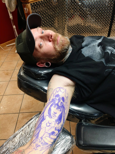 Explore sleeve men tattoo ideas, creative tattoo ideas in Rapid City, available at Convicted Designs Tattoo & Piercing