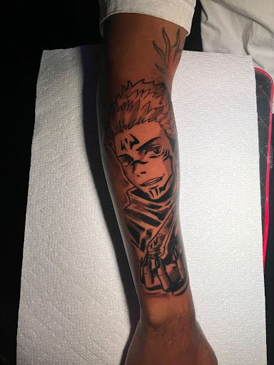 Explore cover up tattoo ideas for upper back, creative tattoo ideas in Pineville, available at Black Cloud Tattoo and Piercing