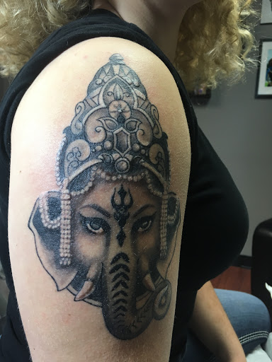 Explore leg tattoo ideas black male, creative tattoo ideas in Coldwater, available at Relevant Tattoo and Piercing
