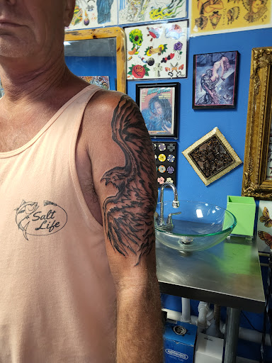 Explore ivy tattoo ideas, creative tattoo ideas in Englewood, available at The Original Big Daddy Tattoo & Body Piercing est.1997 est.1997