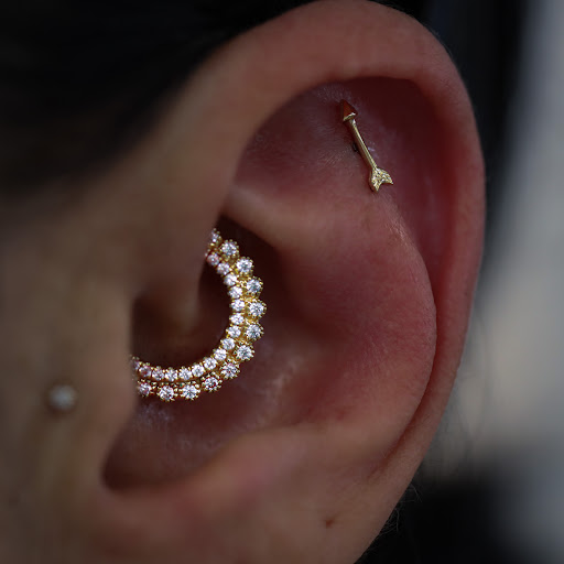 Explore marriage ring tattoo ideas, creative tattoo ideas in Redondo Beach, available at Envy Body Piercing