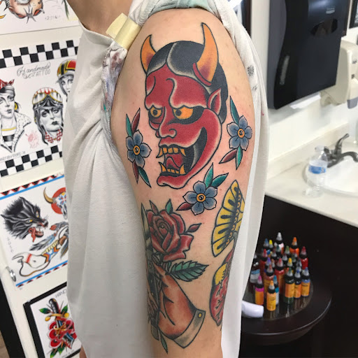 Explore cover up tattoo ideas for upper arm, creative tattoo ideas in Madera, available at Sea Wolf Tattoo