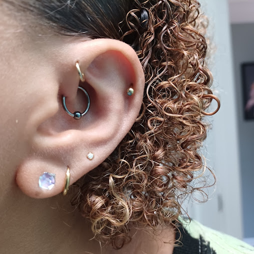 Explore axolotl tattoo ideas, creative tattoo ideas in Roseville, available at Ravens Mark Body Art Collective Tattoos & Piercings