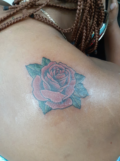 Find back tattoo ideas women for your next unique tattoo in Hampton at Blue Horseshoe Tattoo and Body Piercing