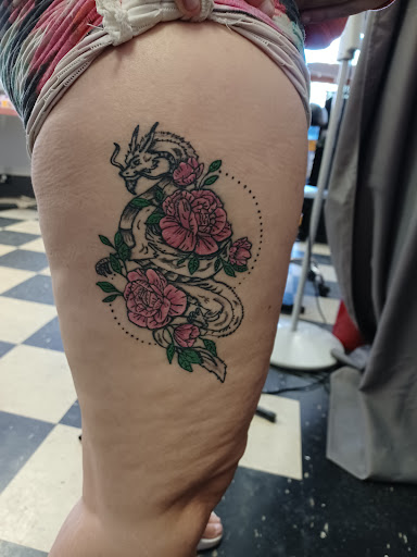 Explore squid tattoo ideas, creative tattoo ideas in Owosso, available at Twisted ink tattoo