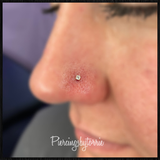 Explore snail tattoo ideas, creative tattoo ideas in Fort Walton Beach, available at Piercings by Torrie