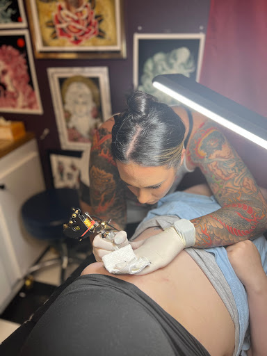 Explore back piece tattoo ideas female, creative tattoo ideas in Georgetown, available at Iron Rite Tattoo South