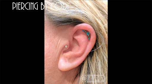 Explore hand tattoo ideas for guys, creative tattoo ideas in Fort Myers, available at Needful Things Inc