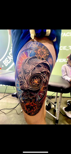 Explore under chin tattoo ideas, creative tattoo ideas in Boston, available at Boston Barber & Tattoo Co.