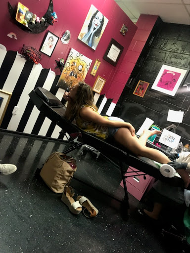 Explore checkered flag tattoo ideas, creative tattoo ideas in Louisburg, available at Lewter Tattoos and Piercing