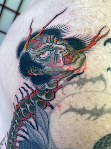 Explore grumpy bear tattoo ideas, creative tattoo ideas in Honolulu, available at Sacred Art Tattoo Waikiki