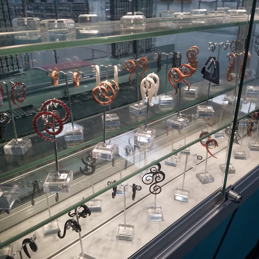 Explore wolf neck tattoo ideas, creative tattoo ideas in Huntington Beach, available at Tommy Ts Body Piercing