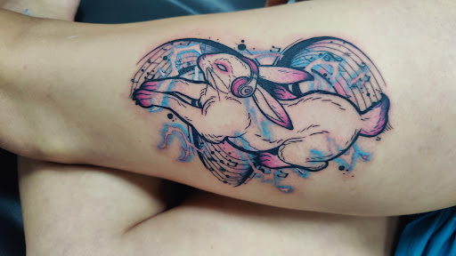 Explore cute thigh tattoo ideas, creative tattoo ideas in Ocala, available at Black Lotus Tattoo & Art Gallery Inc