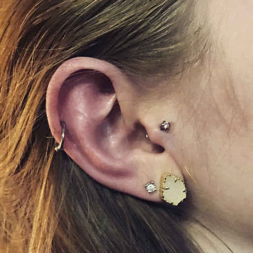 Explore black hole tattoo ideas, creative tattoo ideas in Memphis, available at Studio 42