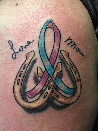 Explore number 9 tattoo ideas, creative tattoo ideas in Springfield, available at Outkast Tattoo Co