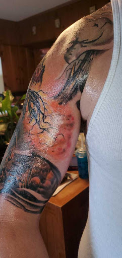 Explore arm tattoo cover up ideas, creative tattoo ideas in Canton, available at The Inkeepers Tattoo Parlor