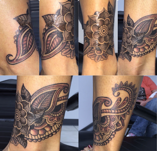 Explore red ink tattoo ideas for guys, creative tattoo ideas in College Station, available at Big Daddys Tattoo Studio Renu Laser Removal