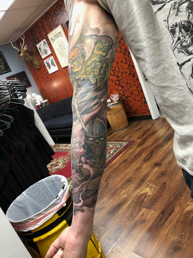 Explore blue bird tattoo ideas, creative tattoo ideas in Des Moines, available at Skin Kitchen Tattoo