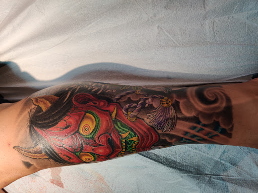 Explore mens behind the ear tattoo ideas, creative tattoo ideas in Peekskill, available at Speakeasy Tattoo Studio