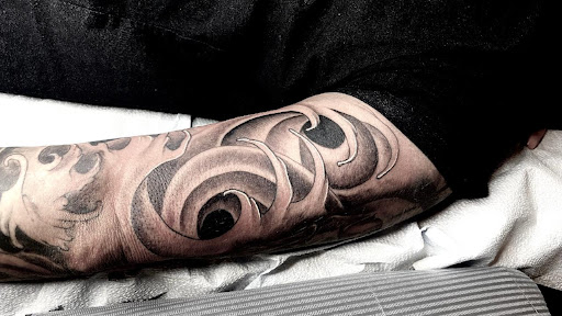 Explore brothers and sisters tattoo ideas, creative tattoo ideas in Grand Rapids, available at Copper Coin Tattoo Parlour