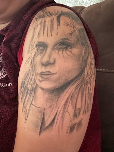 Explore dog and cat tattoo ideas, creative tattoo ideas in Tahlequah, available at Monochrome Ink