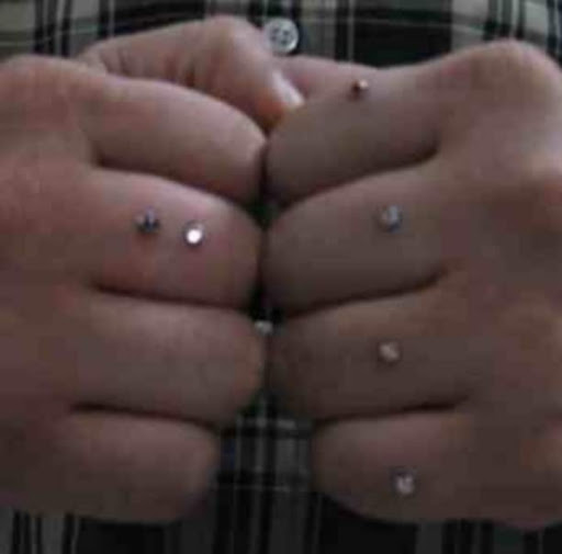 Explore dark tattoo ideas for men, creative tattoo ideas in Hialeah, available at Allstar Tattoo & Body piercing