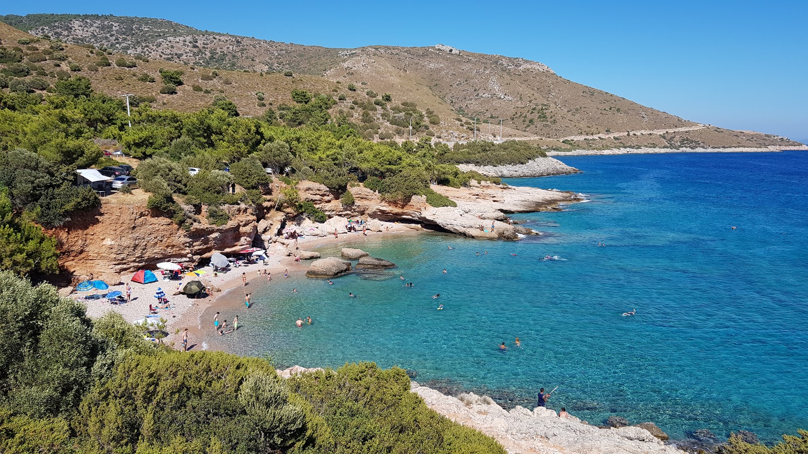 Aquarium beach'in fotoğrafı gri çakıl taşı yüzey ile