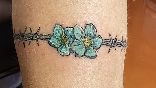 Explore guy leg tattoo ideas, creative tattoo ideas in Calmar, available at FierceNatured Ink