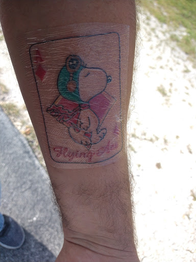 Explore father son tattoos ideas, creative tattoo ideas in Key Largo, available at Fire Ink Tattoo
