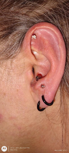 Explore muscle tattoo ideas, creative tattoo ideas in Denver, available at Mile High Ink