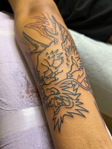 Explore rope tattoo ideas, creative tattoo ideas in Arlington, available at Benchmark Tattoos