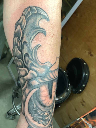 Explore baby tattoo ideas, creative tattoo ideas in Turner, available at Heathen Ink