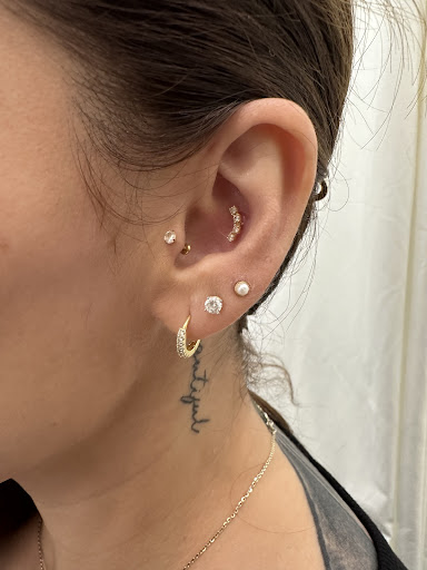 Explore middle finger tattoo ideas, creative tattoo ideas in Goodyear, available at Desert Diamondz Piercing and Tattoo Studio
