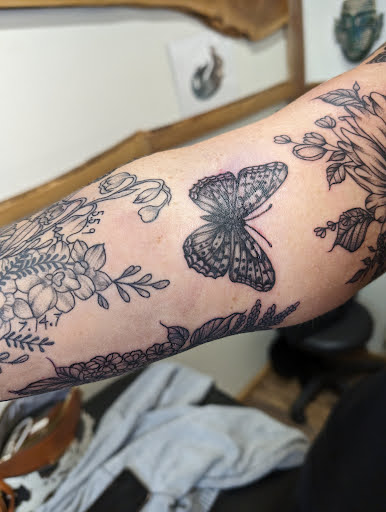Explore tattoo ideas aquarius, creative tattoo ideas in Cornelia, available at Prismatic Pulse Tattoo