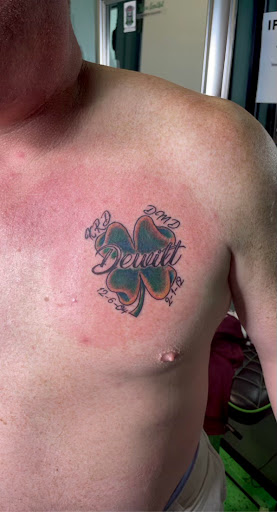 Explore hand tattoo ideas man, creative tattoo ideas in Meridian, available at Creative Pain Tattoo Studio