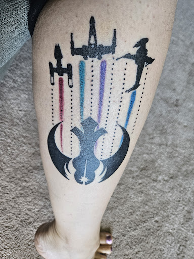 Find in between boob tattoo ideas for your next unique tattoo in Minneapolis at Peregrine Tattoo