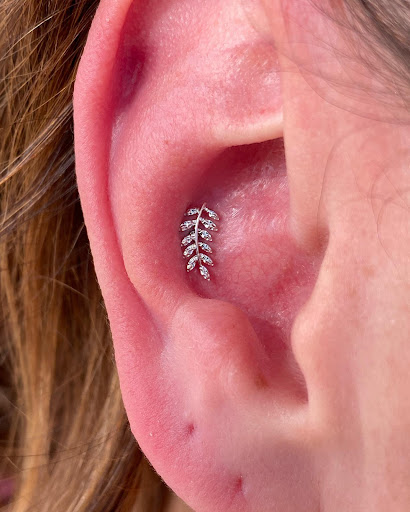 Explore behind the ear tattoo ideas, creative tattoo ideas in Dover, available at Agap Body Piercings