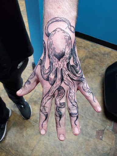 Explore rip tattoo ideas for females, creative tattoo ideas in Westland, available at Premier Tattoo Company Westland