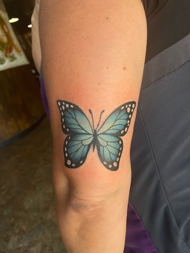 Explore tattoo ideas for back of shoulder, creative tattoo ideas in Peoria, available at Modern Ink Tattoo