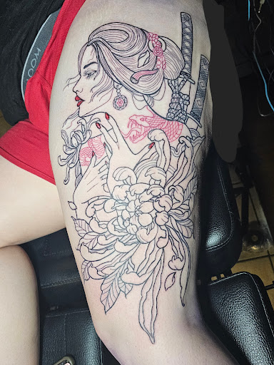 Explore middle neck tattoo ideas, creative tattoo ideas in Valdosta, available at PATRIOT TATTOOER