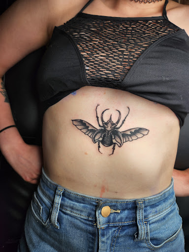 Explore fishing hook tattoo ideas, creative tattoo ideas in Fort Worth, available at Darkside of Texas Tattoo & Piercing