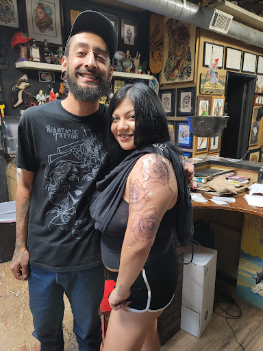 Explore tattoo cover up ideas on leg, creative tattoo ideas in Fresno, available at Resistance Tattoo