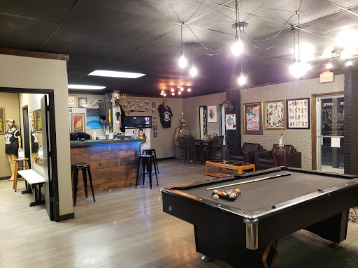 Explore sunflower thigh tattoo ideas, creative tattoo ideas in College Station, available at Legacy Tattoo Lounge